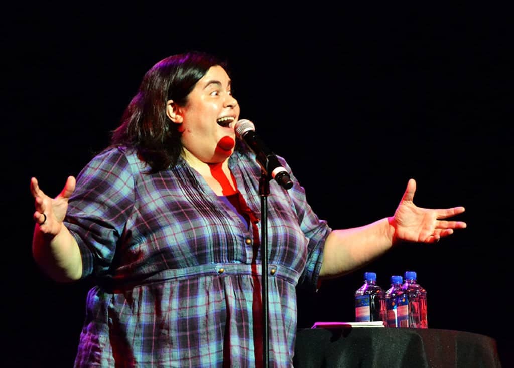 Debra performing a stand-up comedy show. (Source: Algonquin Times)