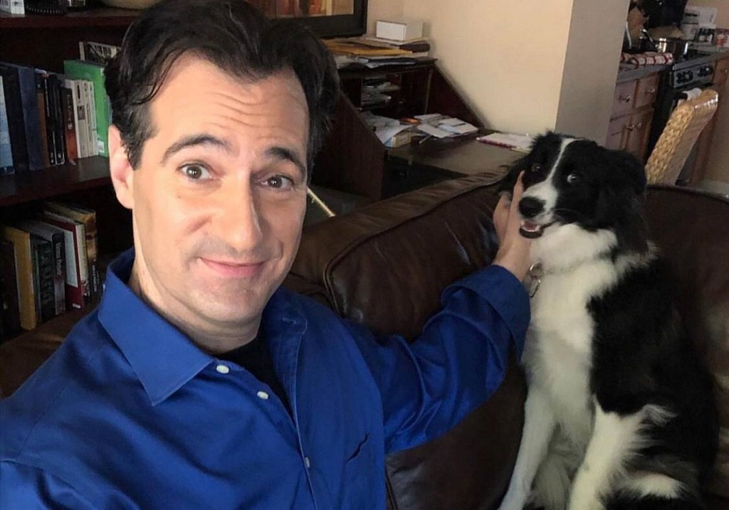 Carl Azuz Picture with his dog (Source: Instagram)